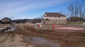 Some mud at corner of Sammon and Jolliffe - paved though!