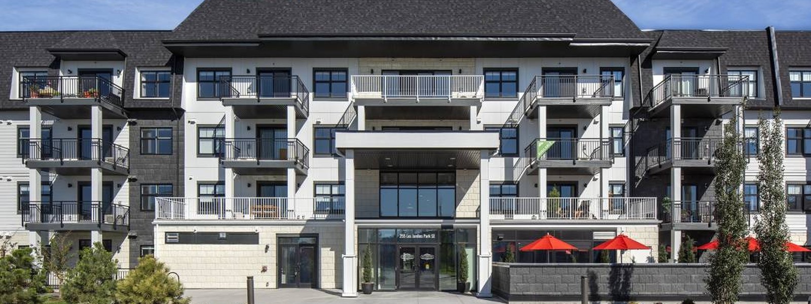 New homes at Les Jardins Townhomes and Condos development by Jayman in Calgary, Alberta