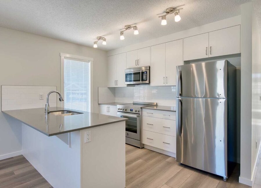 The Empire II new home model plan at the ZEN Livingston by Avalon Master Builder in Calgary